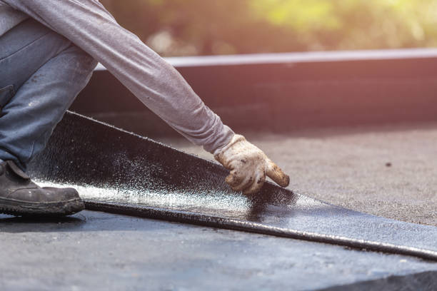 Professional Waterproofing technician working in Deerfield, MI